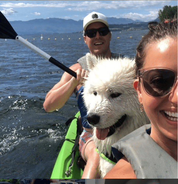Brody on a boat with his owners Grant Findlay-Shirras and Amanda Newman