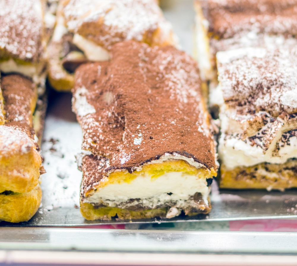 A closeup of some sugary desserts on a tray.